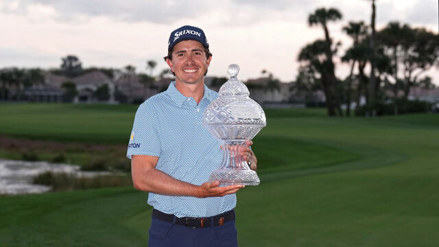 PALM BEACH GARDENS, FLORIDA - MARCH 01: Nico Echavarria of Colombia poses with the winner's trophy after winning the the Cognizant Classic 2026 at PGA National Resort And Spa on March 01, 2026 in Palm Beach Gardens, Florida.