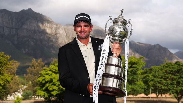 STELLENBOSCH, SOUTH AFRICA - MARCH 01: Casey Jarvis of South Africa poses for a photo with the trophy following victory on day four of the Investec South African Open Championship 2026 at Stellenbosch Golf Club on March 01, 2026 in Stellenbosch, South Africa.