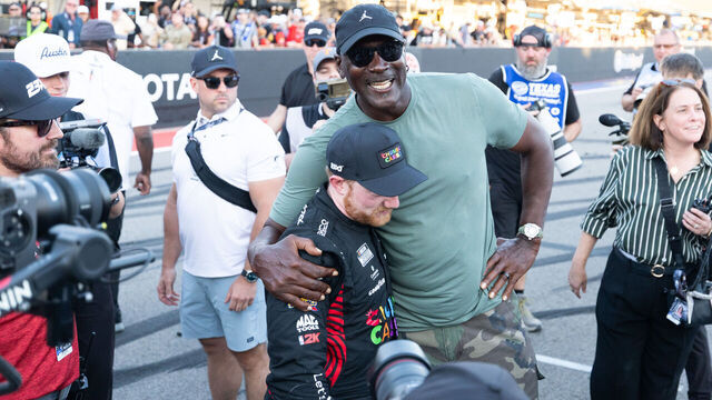 AUSTIN, TX - MARCH 01: Michael Jordon celebrates with Tyler Reddick (#45 23XI Racing Chumba Casino Toyota) after Reddick won the the NASCAR Cup Series DuraMAX Texas Grand Prix on March 1, 2026 at Circuit of the Americas in Austin, TX.