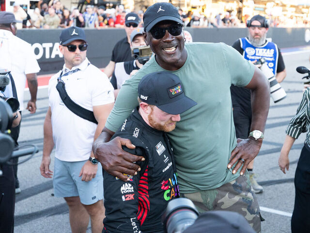 AUSTIN, TX - MARCH 01: Michael Jordon celebrates with Tyler Reddick (#45 23XI Racing Chumba Casino Toyota) after Reddick won the the NASCAR Cup Series DuraMAX Texas Grand Prix on March 1, 2026 at Circuit of the Americas in Austin, TX.