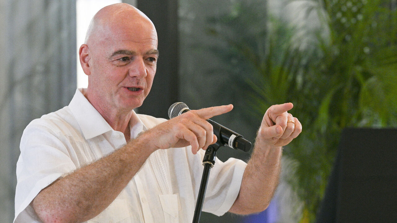 FIFA President Gianni Infantino gestures as he speaks during his visit to the new Concentration Hotel of the Colombian Football Federation in Barranquilla, Colombia, on February 24, 2026. FIFA boss Gianni Infantino told AFP on February 24, 2026, he was "very reassured" about Mexico's hosting of games in the World Cup, in his first comments on the violence triggered by the killing of a drug cartel leader.