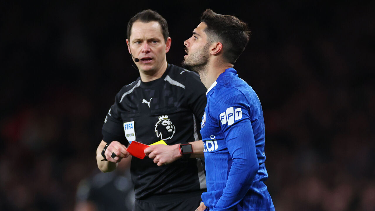 LONDON, ENGLAND - MARCH 01: Pedro Neto of Chelsea is shown a red card by Referee Darren England during the Premier League match between Arsenal and Chelsea at Emirates Stadium on March 01, 2026 in London, England.