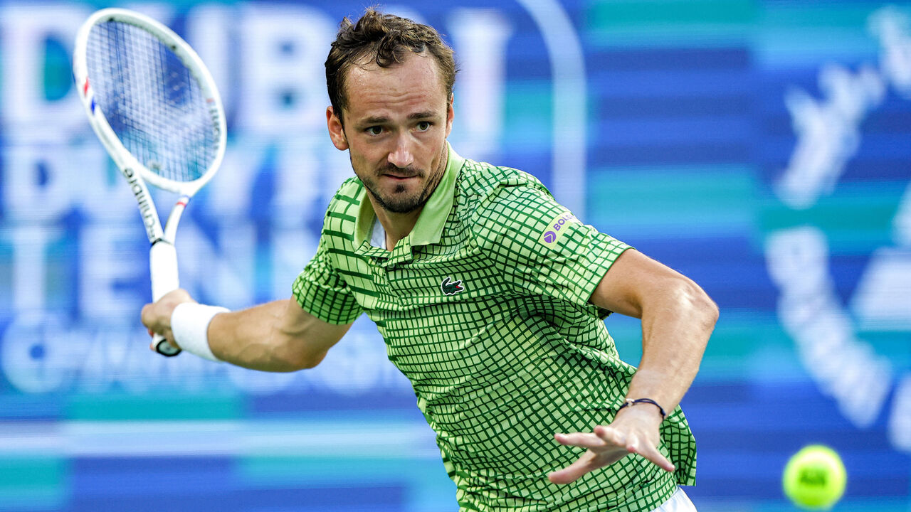 TOPSHOT - Russia's Daniil Medvedev returns a shot during his men's singles semi-final match against Canada's Felix Auger-Aliassime at the Dubai Duty Free Tennis tournament in Dubai on February 27, 2026.