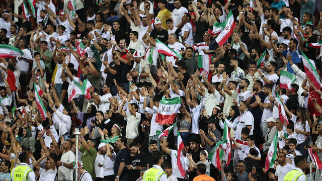 Iran's supporters celebrate a goal during the 2026 FIFA World Cup AFC qualifiers group A football match between Iran and Qatar at the Rashid Stadium in Dubai on October 15, 2024.