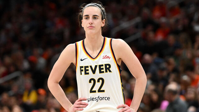 BOSTON, MASSACHUSETTS - JULY 15: Caitlin Clark #22 of the Indiana Fever watches a play against the Connecticut Sun during the second half at the TD Garden on July 15, 2025 in Boston, Massachusetts. NOTE TO USER: User expressly acknowledges and agrees that, by downloading and/or using this Photograph, user is consenting to the terms and conditions of the Getty Images License Agreement.