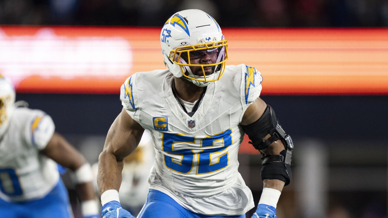 FOXBOROUGH, MASSACHUSETTS - JANUARY 11: Khalil Mack #52 of the Los Angeles Chargers runs around the edge during an NFL wild card playoff game against the New England Patriots at Gillette Stadium on January 11, 2026 in Foxborough, Massachusetts.