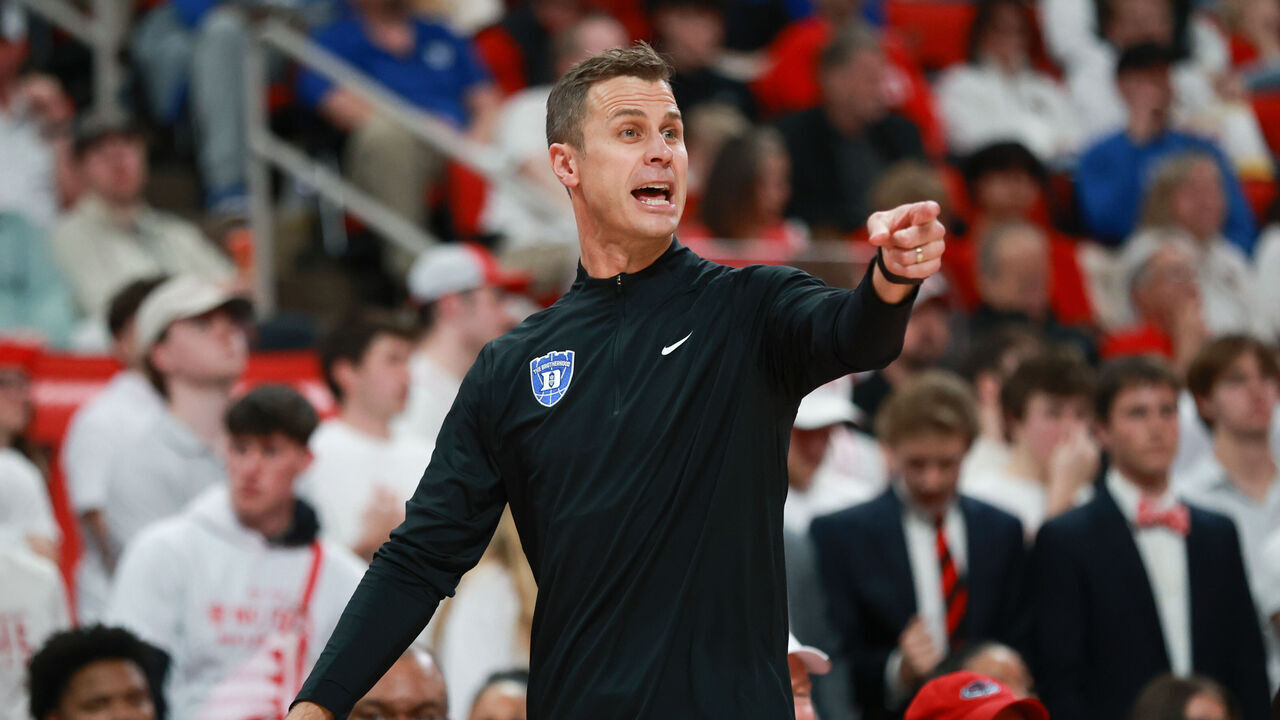 RALEIGH, NC - MARCH 02: Head coach Jon Scheyer of the Duke Blue Devils signals to his team during the college basketball game between the NC State Wolfpack and the Duke Blue Devils on March 2, 2026 at the Lenovo Center in Raleigh, N.C.