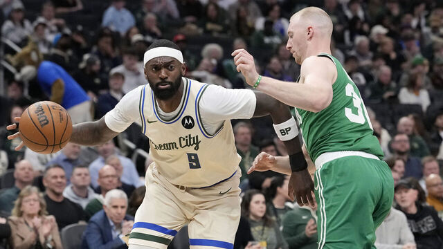 MILWAUKEE, WISCONSIN - MARCH 02: Bobby Portis #9 of the Milwaukee Bucks dribbles the ball against Sam Hauser #30 of the Boston Celtics during the second quarter at Fiserv Forum on March 02, 2026 in Milwaukee, Wisconsin.