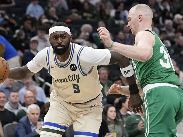 MILWAUKEE, WISCONSIN - MARCH 02: Bobby Portis #9 of the Milwaukee Bucks dribbles the ball against Sam Hauser #30 of the Boston Celtics during the second quarter at Fiserv Forum on March 02, 2026 in Milwaukee, Wisconsin.