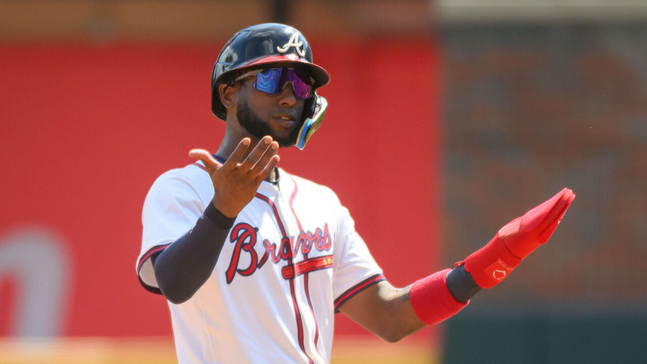 ATLANTA, GEORGIA - SEPTEMBER 14: Jurickson Profar #7 of the Atlanta Braves gestures from second base in the fifth inning of a game against the Houston Astros at Truist Park on September 14, 2025 in Atlanta, Georgia.