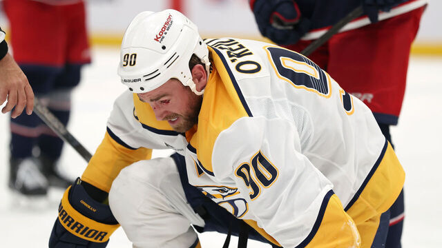COLUMBUS, OHIO - MARCH 3: Ryan O'Reilly #90 of the Nashville Predators gets up off of the ice after sustaining an injury to his eye during the third period of the game against the Columbus Blue Jackets at Nationwide Arena on March 3, 2026 in Columbus, Ohio. Columbus defeated Nashville 3-2.