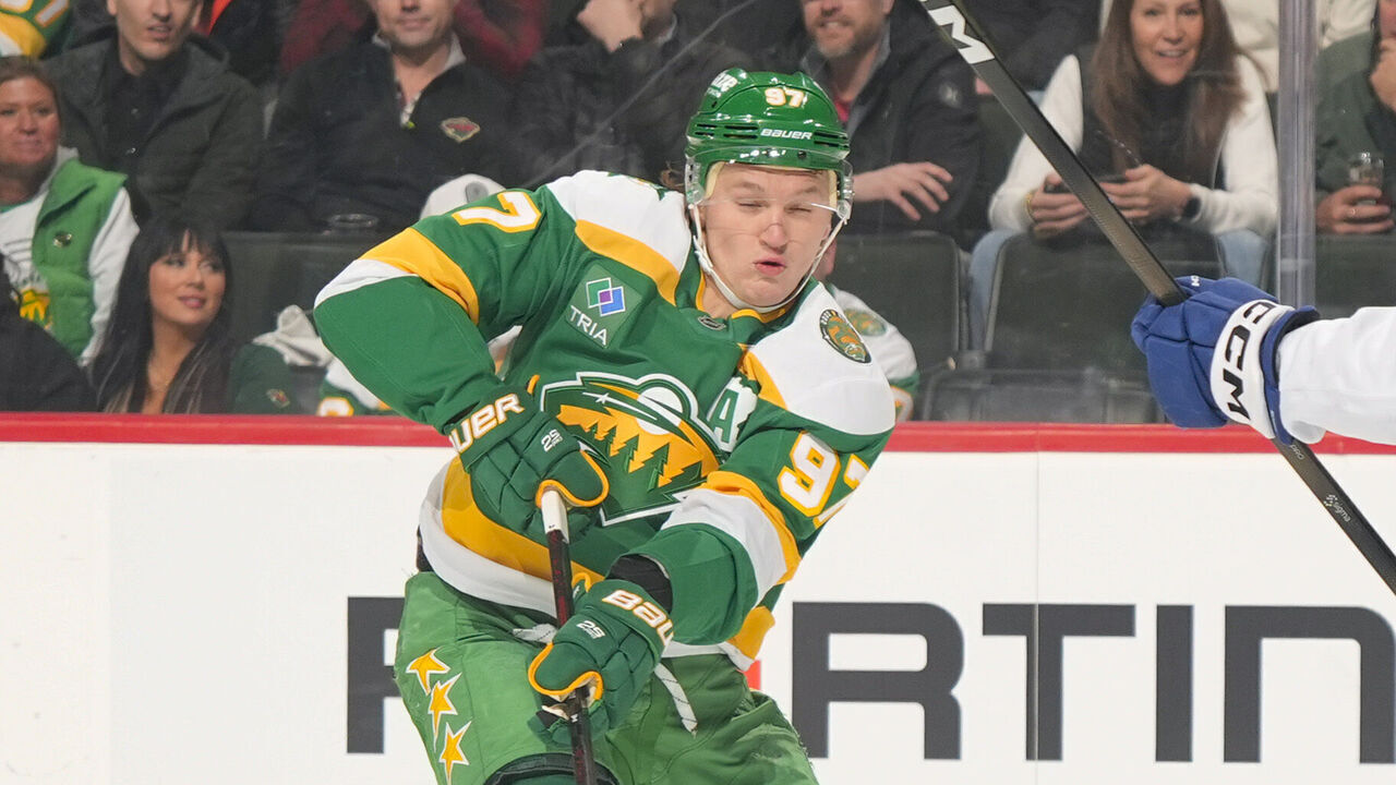 SAINT PAUL, MN - MARCH 3: Kirill Kaprizov #97 of the Minnesota Wild defends against Janis Moser #90 of the Tampa Bay Lightning during the game at Grand Casino Arena on March 3, 2026 in Saint Paul, Minnesota.