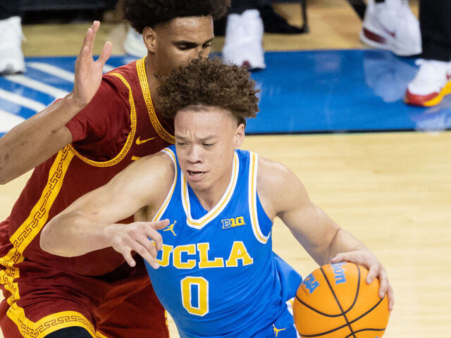 LOS ANGELES, CALIFORNIA - FEBRUARY 24: Trent Perry #0 of the UCLA Bruins drives towards the basket during the first half of a game against the USC Trojans at Pauley Pavilion on February 24, 2026 in Los Angeles, California.