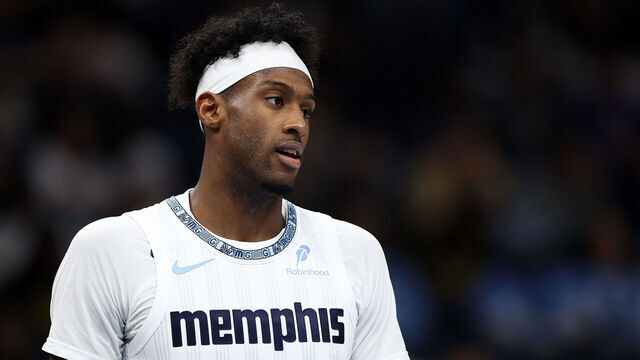 MEMPHIS, TENNESSEE - FEBRUARY 25: Olivier-Maxence Prosper #18 of the Memphis Grizzlies looks on during the game against the Golden State Warriors at FedExForum on February 25, 2026 in Memphis, Tennessee.