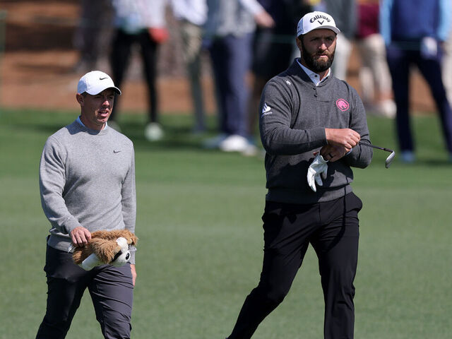AUGUSTA, GEORGIA - APRIL 09: (L-R) Rory McIlroy of Northern Ireland and Jon Rahm of Spain walk on the second hole during a practice round prior to the 2025 Masters Tournament at Augusta National Golf Club on April 09, 2025 in Augusta, Georgia.