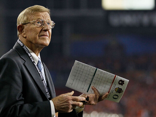 GLENDALE, AZ - JANUARY 10: ESPN reporter Lou Holtz looks on during the Tostitos BCS National Championship Game between the Oregon Ducks and the Auburn Tigers at University of Phoenix Stadium on January 10, 2011 in Glendale, Arizona.