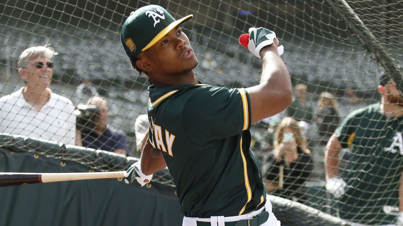 OAKLAND, CA - JUNE 15: First round draft pick Kyler Murray of the Oakland Athletics takes batting practice after signing his contract at the Oakland Alameda Coliseum on June 15, 2018 in Oakland, California.