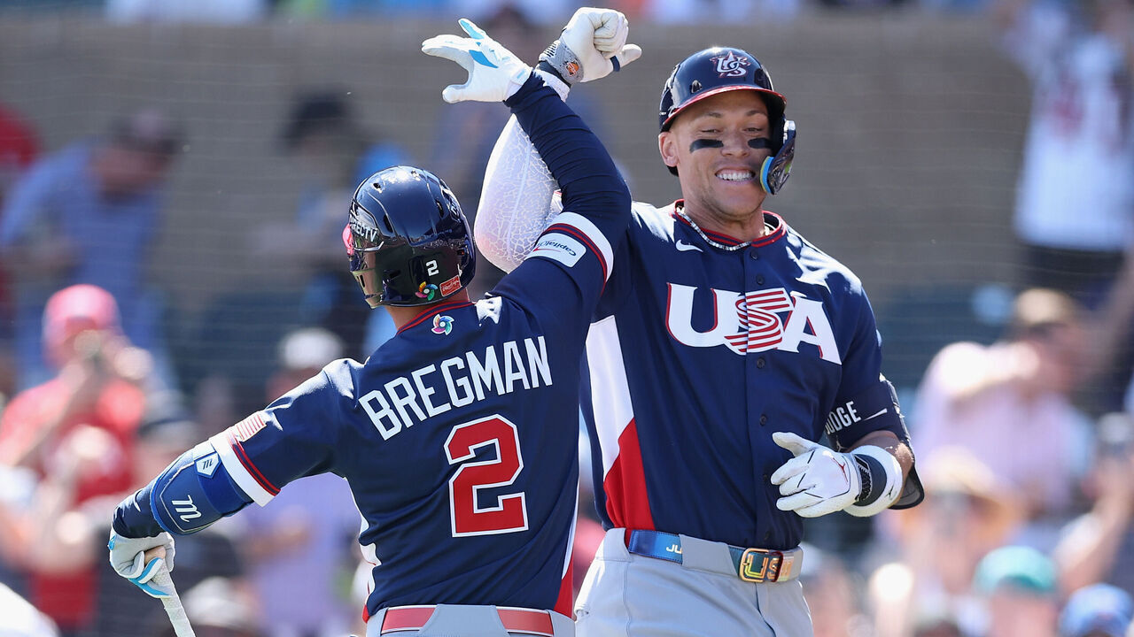 SCOTTSDALE, ARIZONA - MARCH 04: Aaron Judge #99 of Team United States celebrates with Alex Bregman #2 after hitting a solo home run against the Colorado Rockies during the first inning of the MLB exhibition game at Salt River Fields at Talking Stick on March 04, 2026 in Scottsdale, Arizona.