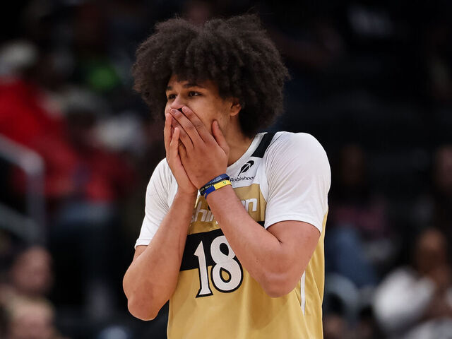 WASHINGTON, DC - FEBRUARY 28: Kyshawn George #18 of the Washington Wizards reacts after being called for a foul against the Toronto Raptors during the second half at Capital One Arena on February 28, 2026 in Washington, DC.