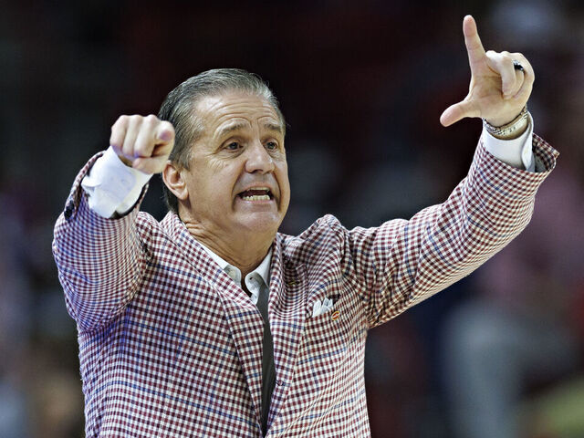 FAYETTEVILLE, ARKANSAS - MARCH 04: Head Coach John Calipari of the Arkansas Razorbacks directs his team in the first half during the game against the Texas Longhorns at Bud Walton Arena on March 04, 2026 in Fayetteville, Arkansas.