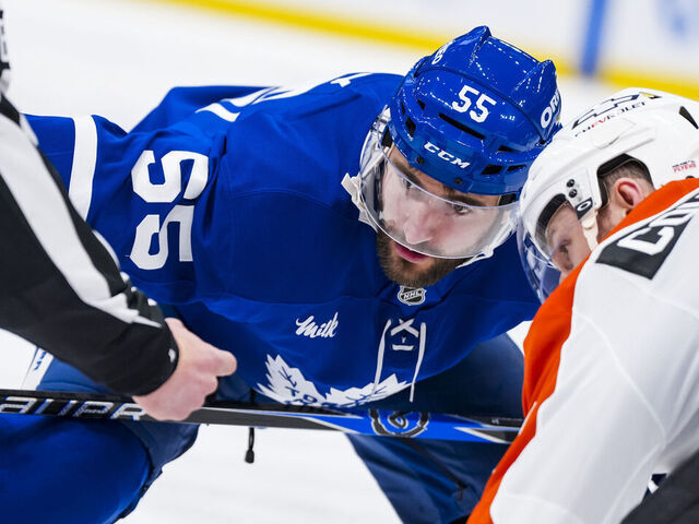 TORONTO, CANADA - MARCH 2: Nicolas Roy #55 of the Toronto Maple Leafs takes a face-off against the Philadelphia Flyers during the first period at the Scotiabank Arena on March 2, 2026 in Toronto, Ontario, Canada.