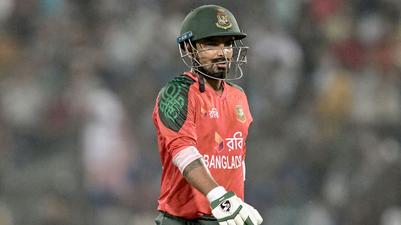 Bangladesh's captain Litton Das walks back to the pavilion after his dismissal by West Indies' Akeal Hosein during the first Twenty20 international cricket match between Bangladesh and West Indies at a stadium in Chittagong on October 27, 2025.