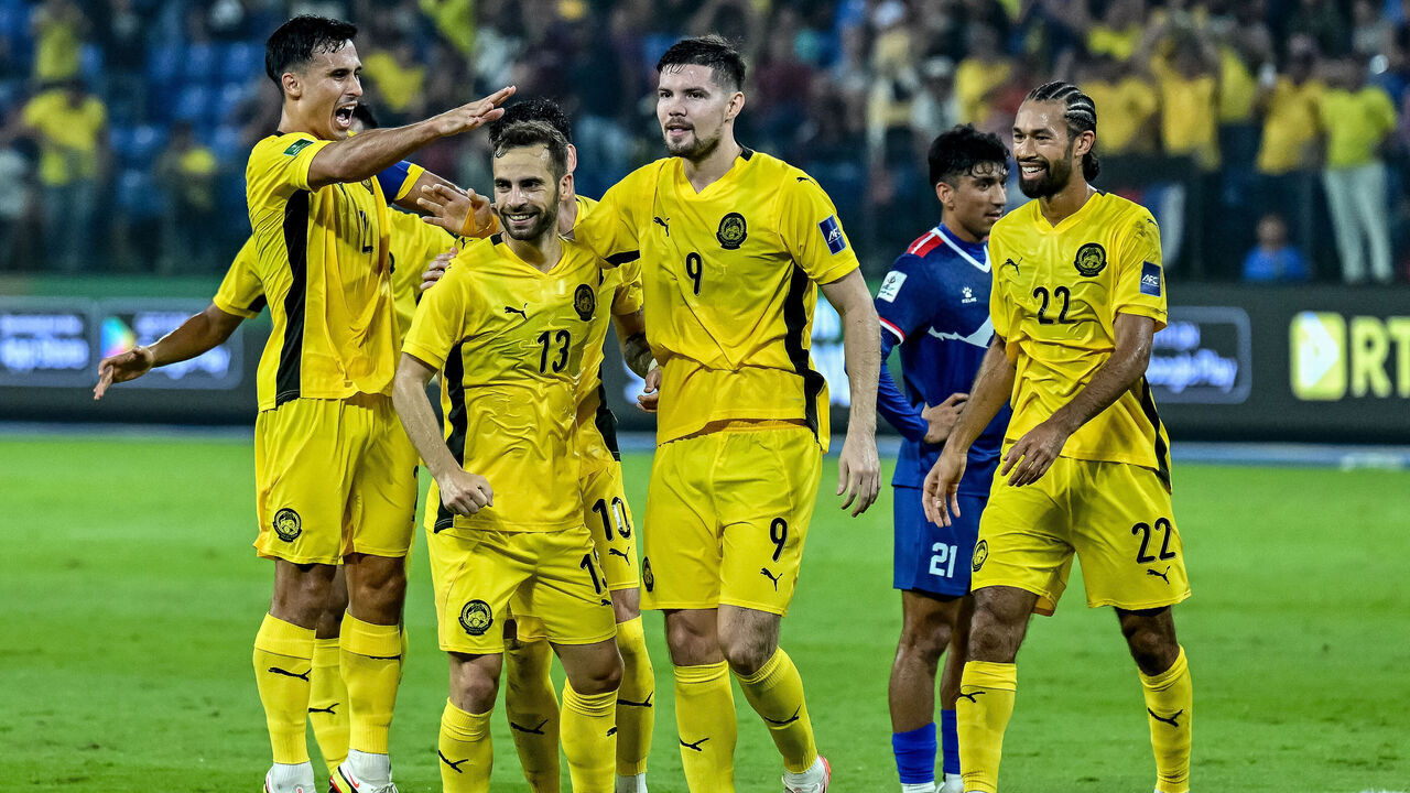 Malaysia's Hector Hevel (2L) celebrates a goal with his teammates during the Asian Cup Qualifiers between Malaysia and Nepal at Stadium Sultan Ibrahim in Johor Bahru on March 25, 2025.