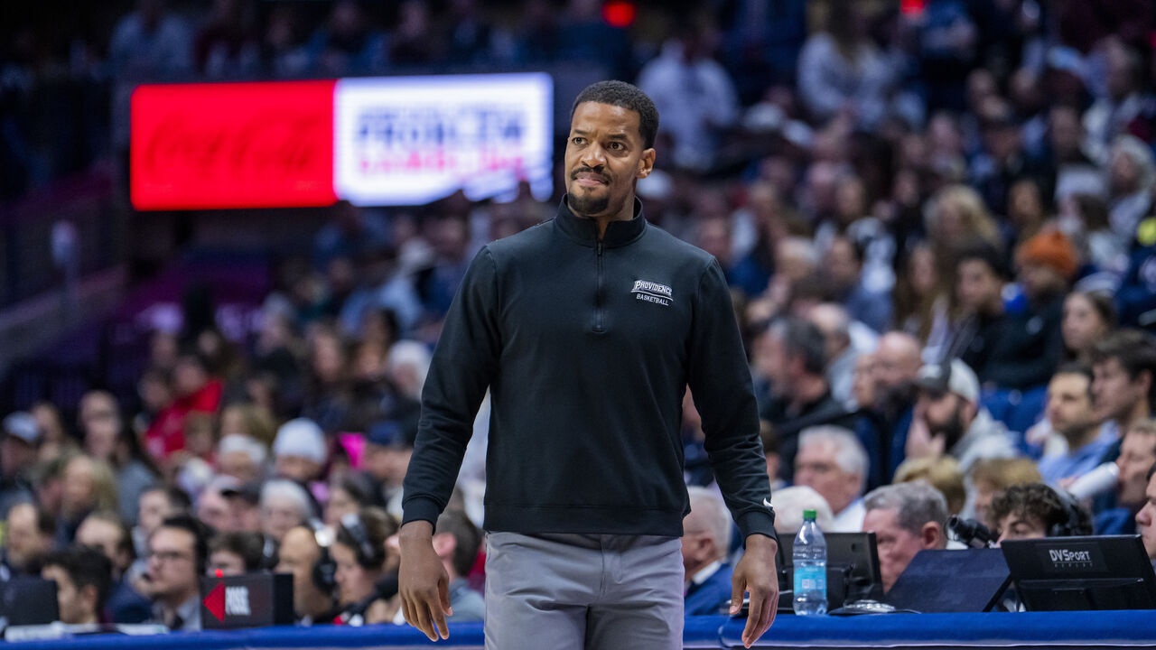 STORRS, CONNECTICUT - JANUARY 27: Providence Friars head coach Kim English coaches his team against the Connecticut Huskies during the first half of an NCAA men's basketball game at Harry A. Gampel Pavilion on January 27, 2026 in Storrs, Connecticut.