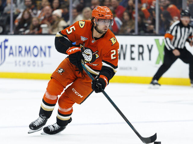 ANAHEIM, CALIFORNIA - DECEMBER 22: Ryan Poehling #25 of the Anaheim Ducks skates with the puck during the second period against the Seattle Kraken at Honda Center on December 22, 2025 in Anaheim, California.