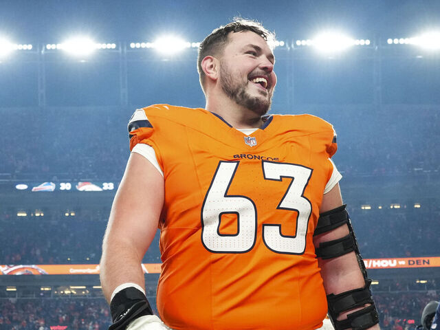 DENVER, CO - JANUARY 17: Alex Palczewski #63 of the Denver Broncos celebrates after an NFL divisional playoff football game against the Buffalo Bills at Empower Field At Mile High on January 17, 2026 in Denver, Colorado.