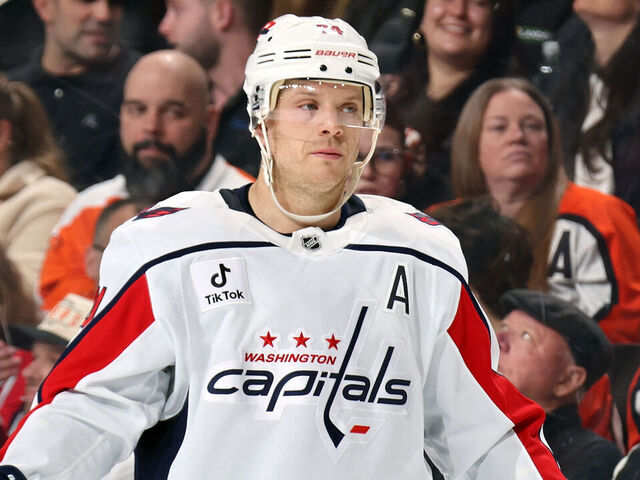 PHILADELPHIA, PENNSYLVANIA - FEBRUARY 03: John Carlson #74 of the Washington Capitals looks on against the Philadelphia Flyers at the Xfinity Mobile Arena on February 3, 2026 in Philadelphia, Pennsylvania.