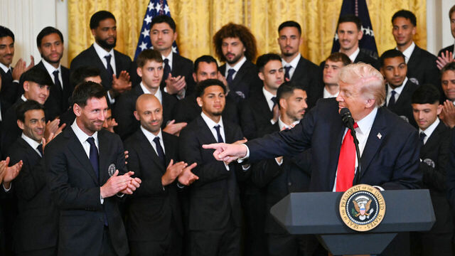 US President Donald Trump points to Argentinian star Lionel Messi (L) during an event for Inter Miami CF, winners of the 2025 Major League Soccer Cup, in the East Room of the White House in Washington, DC, on March 5, 2026.