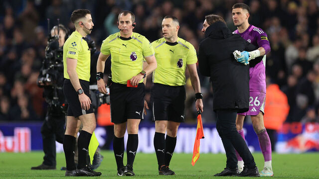 LEEDS, ENGLAND - FEBRUARY 28: Leeds United goalkeeper Karl Darlow holds back Leeds United manager Daniel Farke as he argues with referee Peter Bankes and his officials having been shown the red card and sent off after the Premier League match between Leeds United and Manchester City at Elland Road on February 28, 2026 in Leeds, United Kingdom.