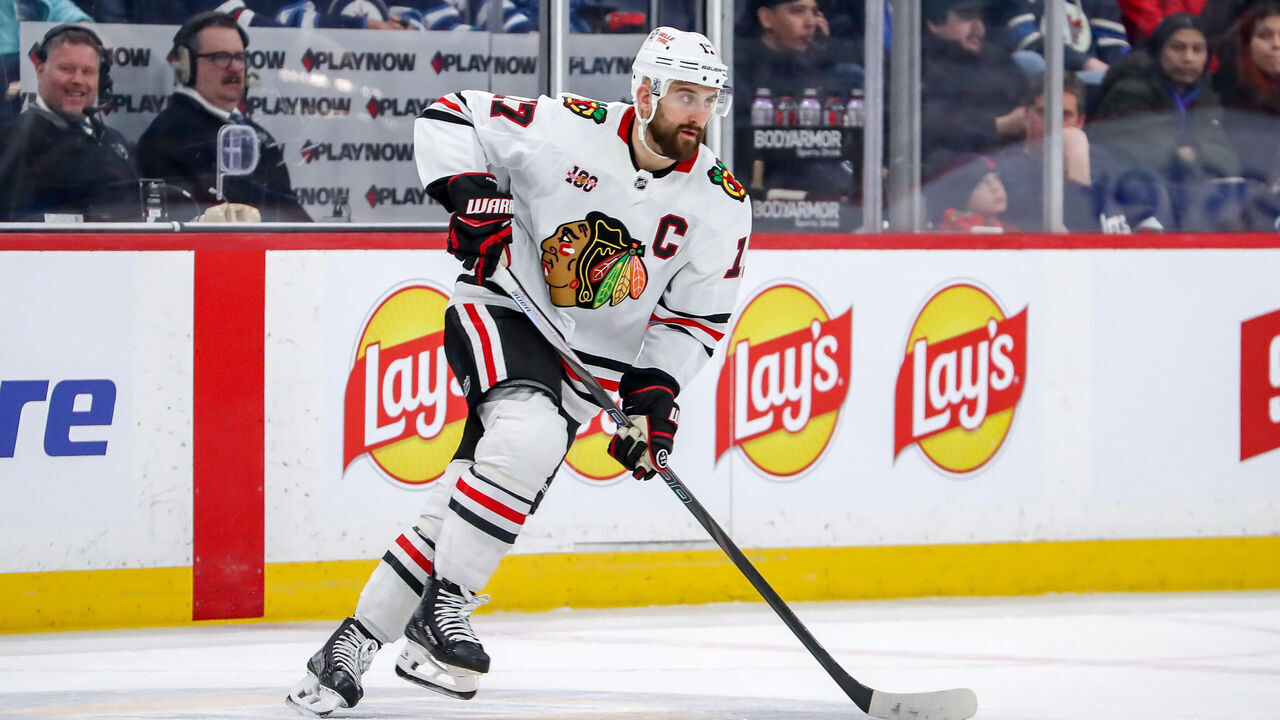 WINNIPEG, CANADA - MARCH 3: Nick Foligno #17 of the Chicago Blackhawks plays the puck up the ice during second period action against the Winnipeg Jets at the Canada Life Centre on March 3, 2026 in Winnipeg, Manitoba, Canada. The Jets defeated the Hawks 3-2 in overtime.