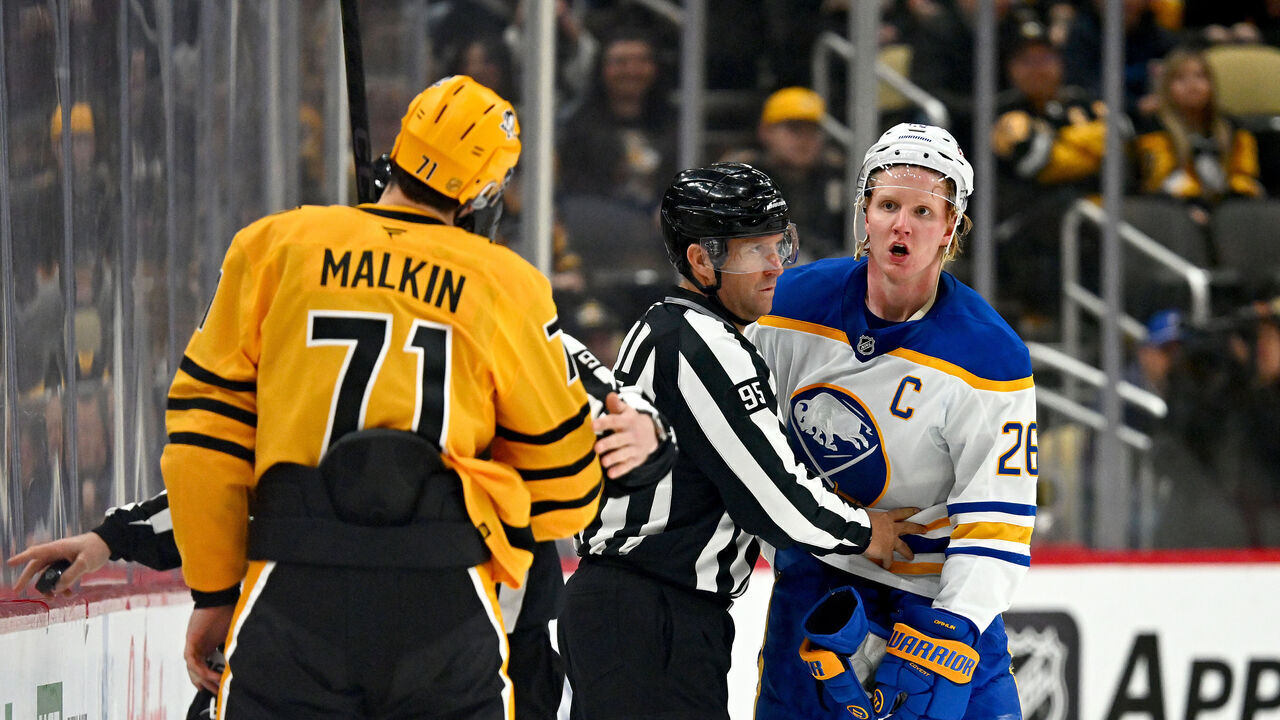 PITTSBURGH, PA - MARCH 05: Rasmus Dahlin #26 of the Buffalo Sabres has a disagreement with Evgeni Malkin #71 of the Pittsburgh Penguins at PPG PAINTS Arena on March 5, 2026 in Pittsburgh, Pennsylvania.