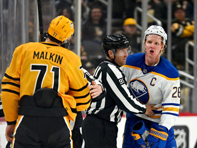PITTSBURGH, PA - MARCH 05: Rasmus Dahlin #26 of the Buffalo Sabres has a disagreement with Evgeni Malkin #71 of the Pittsburgh Penguins at PPG PAINTS Arena on March 5, 2026 in Pittsburgh, Pennsylvania.