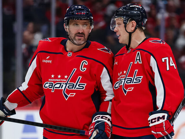 WASHINGTON, DC - OCTOBER 31: Alex Ovechkin #8 of the Washington Capitals speaks with John Carlson #74 during the second period of the game against the New York Islanders at Capital One Arena on October 31, 2025 in Washington, DC.