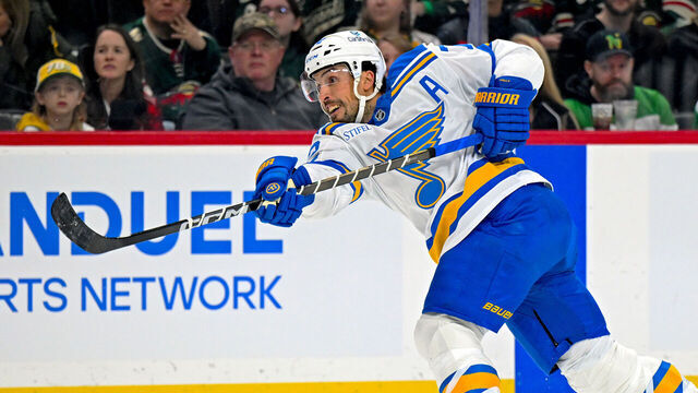 SAINT PAUL, MN - MARCH 01: St. Louis Blues defensemen Justin Faulk (72) shoots the puck during the first period of a NHL game between the Minnesota Wild and St. Louis Blues on March 1, 2026, at Grand Casino Arena in Saint Paul, MN.