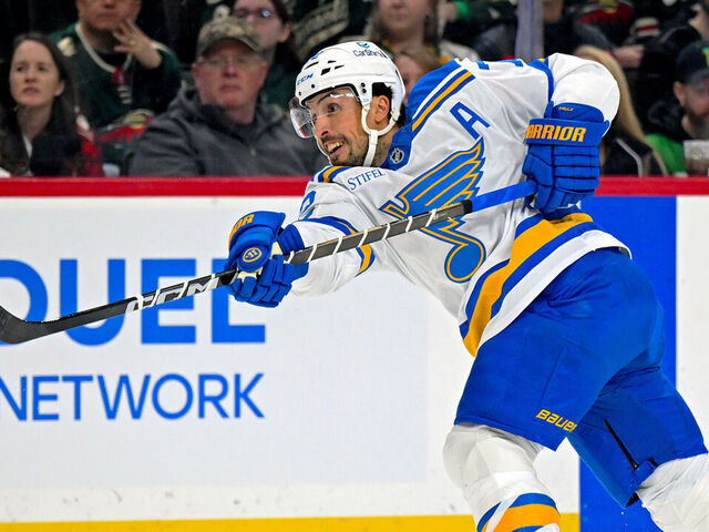 SAINT PAUL, MN - MARCH 01: St. Louis Blues defensemen Justin Faulk (72) shoots the puck during the first period of a NHL game between the Minnesota Wild and St. Louis Blues on March 1, 2026, at Grand Casino Arena in Saint Paul, MN.