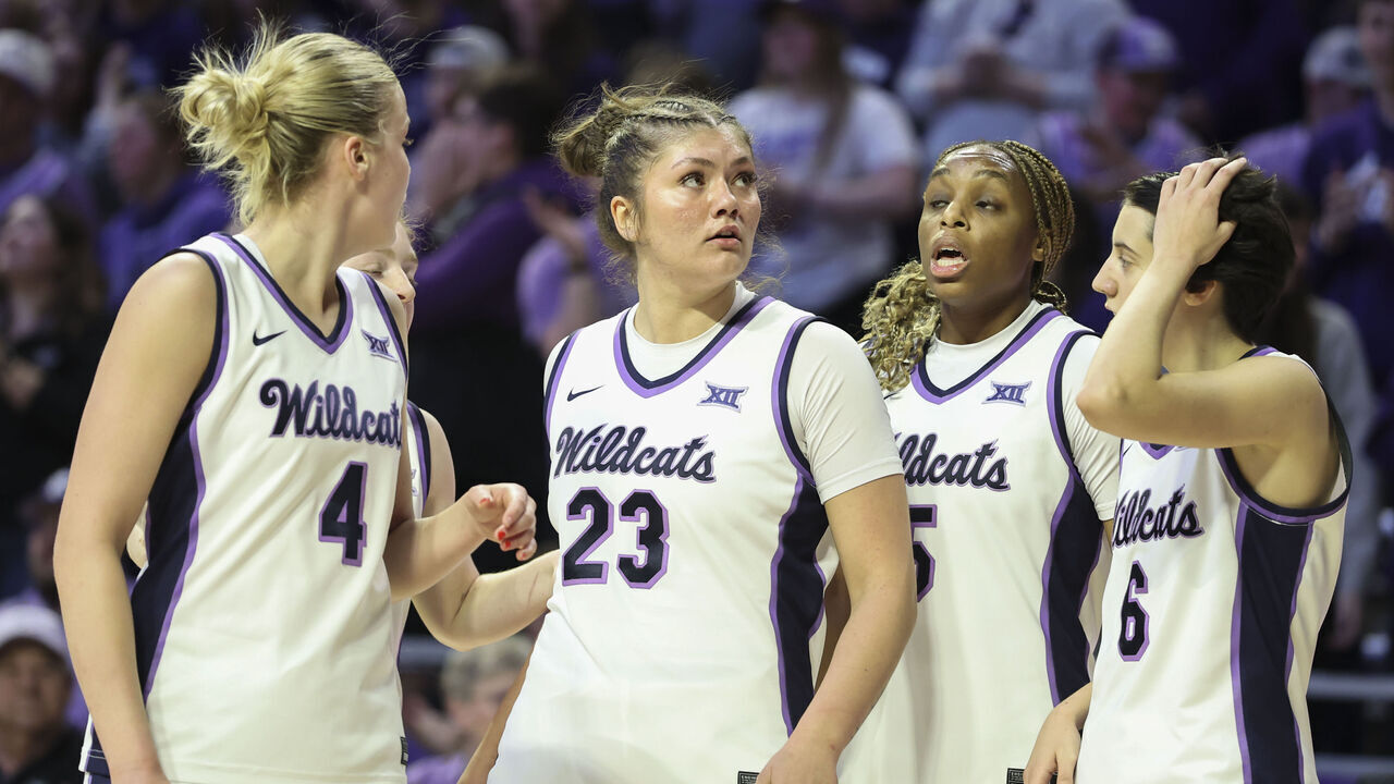 MANHATTAN, KS - MARCH 01: Jordan Speiser #23 of the Kansas State Wildcats with teammates after making a basket and drawing the foul in the first half of a women's Big 12 game between the Iowa State Cyclones and Kansas State Wildcats on March 1, 2026 at Bramlage Coliseum in Manhattan, KS.