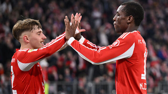 06 March 2026, Bavaria, Munich: Soccer, Men: Bundesliga, Bayern Munich - Bor. Mönchengladbach, Matchday 25, Allianz Arena, Nicolas Jackson (Bayern Munich) celebrates the 4-0 goal with Lennart Karl (l, Bayern Munich). IMPORTANT NOTE: In accordance with the regulations of the DFL German Football League and the DFB German Football Association, it is prohibited to use or have used photographs taken in the stadium and/or of the match in the form of sequential images and/or video-like photo series. Photo: Harry Langer/dpa
