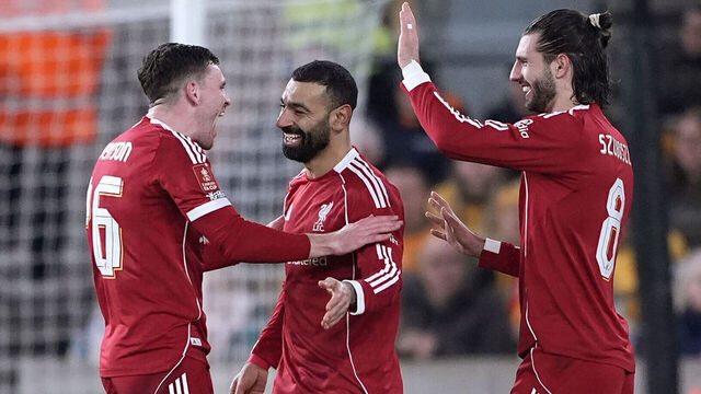 Liverpool's Mohamed Salah (centre) celebrates scoring their side's second goal of the game during the Emirates FA Cup fifth round match at Molineux, Wolverhampton. Picture date: Friday March 6 2026.
