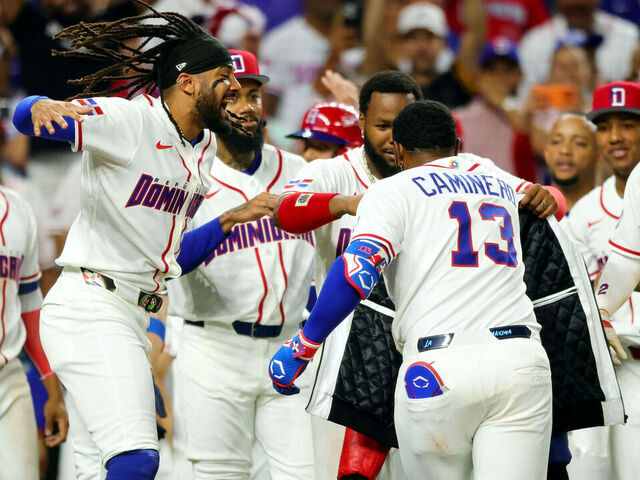 MIAMI, FL - MARCH 06: Junior Caminero #13 of Team Dominican Republic celebrates with teammates after hitting a two-run home run in the sixth inning during the 2026 World Baseball Classic Pool D game presented by Capital One between Team Nicaragua and Team Dominican Republic at loanDepot park on Friday, March 6, 2026 in Miami, Florida.