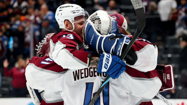 ANAHEIM, CA - MARCH 3: Scott Wedgewood #41 of the Colorado Avalanche celebrates their victory with Valeri Nichushkin #13 of the Colorado Avalanche and MacKenzie Blackwood #39 of the Colorado Avalanche against the Anaheim Ducks at Honda Center on March 3, 2026 in Anaheim, California.