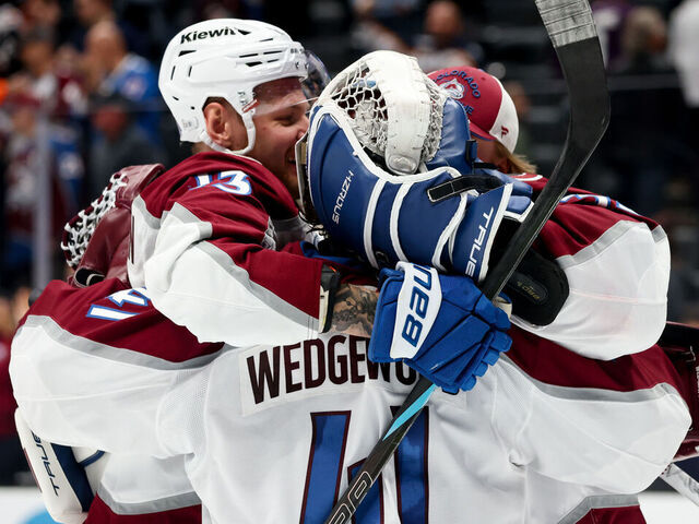 ANAHEIM, CA - MARCH 3: Scott Wedgewood #41 of the Colorado Avalanche celebrates their victory with Valeri Nichushkin #13 of the Colorado Avalanche and MacKenzie Blackwood #39 of the Colorado Avalanche against the Anaheim Ducks at Honda Center on March 3, 2026 in Anaheim, California.