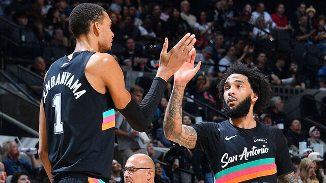 SAN ANTONIO, TX - MARCH 6: Victor Wembanyama #1 and Julian Champagnie #30 of the San Antonio Spurs high five during the game against the LA Clippers on March 6, 2026 at the Frost Bank Center in San Antonio, Texas. Mandatory Copyright Notice: Copyright 2026 NBAE (Photos by Michael Gonzales/NBAE via Getty Images)