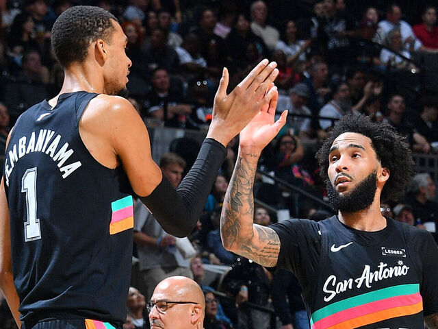 SAN ANTONIO, TX - MARCH 6: Victor Wembanyama #1 and Julian Champagnie #30 of the San Antonio Spurs high five during the game against the LA Clippers on March 6, 2026 at the Frost Bank Center in San Antonio, Texas. Mandatory Copyright Notice: Copyright 2026 NBAE (Photos by Michael Gonzales/NBAE via Getty Images)