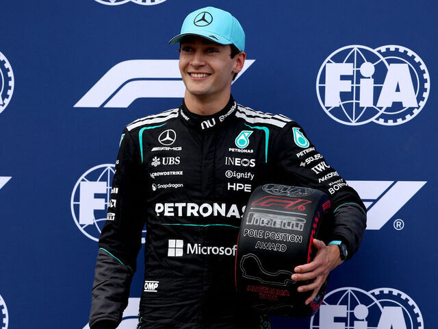 Mercedes' British driver George Russell celebrates his pole position after the qualifying session of the Formula One Australian Grand Prix at the Albert Park Circuit in Melbourne on March 7, 2026. / -- IMAGE RESTRICTED TO EDITORIAL USE - STRICTLY NO COMMERCIAL USE --