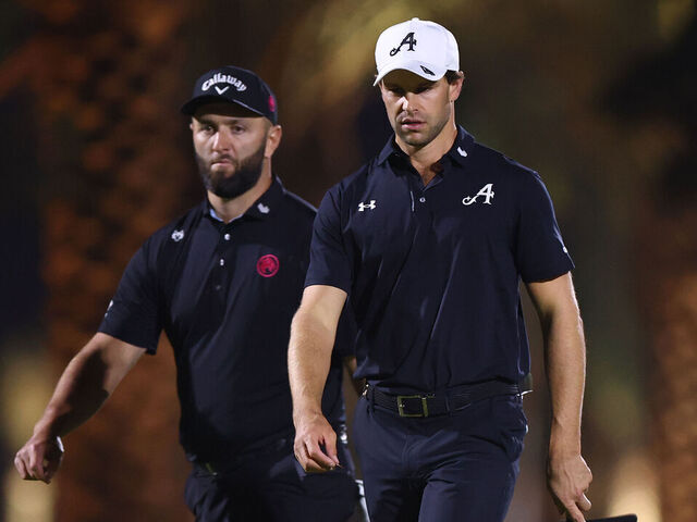 RIYADH, SAUDI ARABIA - FEBRUARY 07: Jon Rahm of Legion XIII and Thomas Detry of 4Aces GC walk onto the 15th green on day four of LIV Golf Riyadh at Riyadh Golf Club on February 07, 2026 in Jeddah, Saudi Arabia.