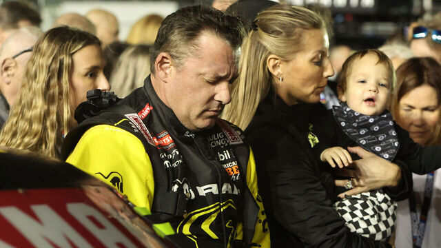 DAYTONA BEACH, FL - FEBRUARY 13: Tony Stewart (#25 Kaulig Racing RAM) stands with his wife Leah and son Dominic prior to the running of the NASCAR Craftsman Truck Series Fresh From Florida 250 on February 13, 2026 at Daytona International Speedway in Daytona Beach, FL.